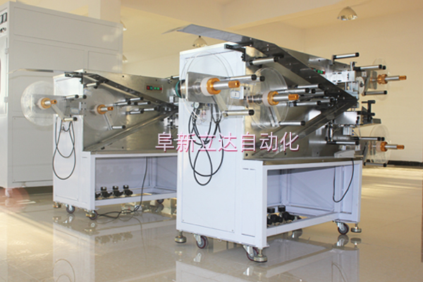 氣動控制張力卷繞機用于啟動電容器的生產(chǎn)中。